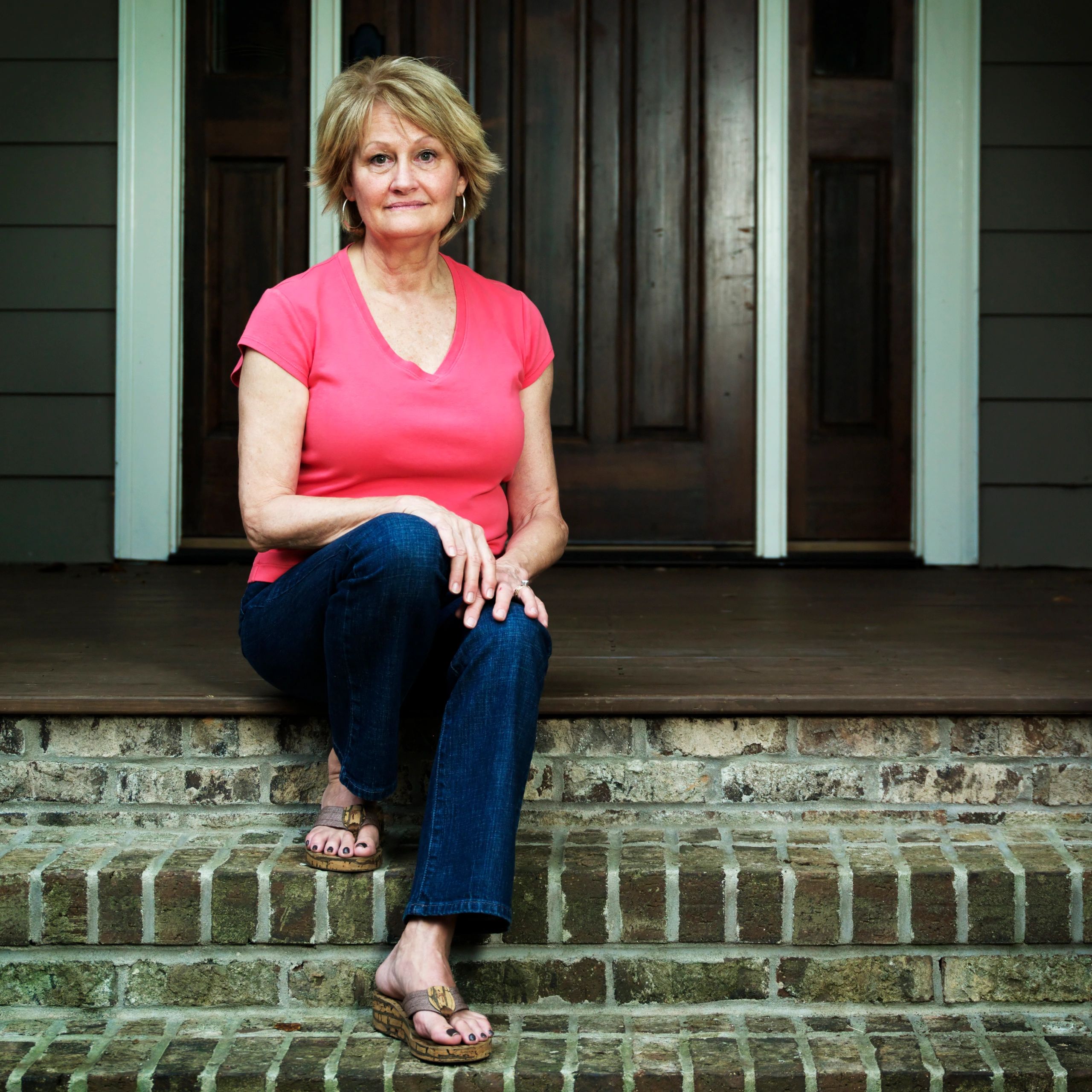 Homeowner portrait on front steps