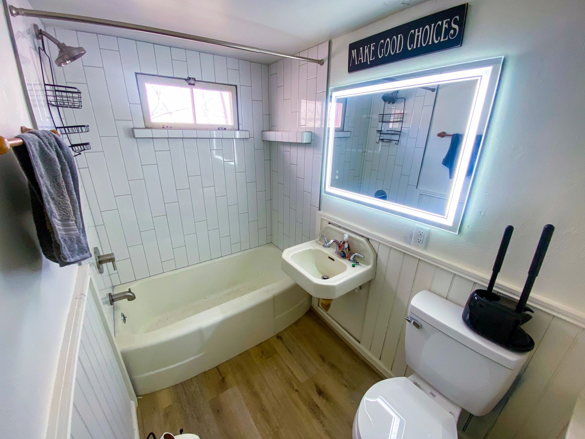 Updated bathroom with clean tile and fixtures